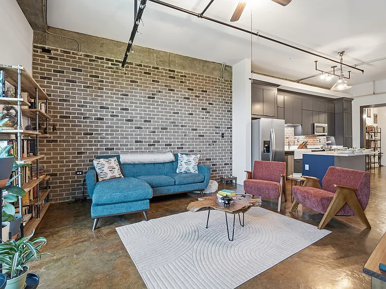 Living Room with Brick Wall