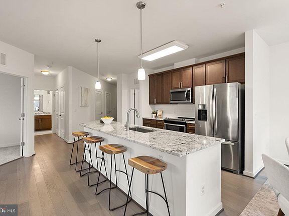 5th image of 9450 Silver King Ct Unit 203