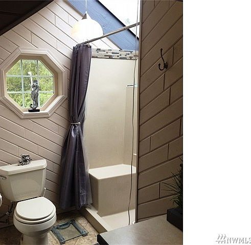 Lovely master bath shower with lots of natural light