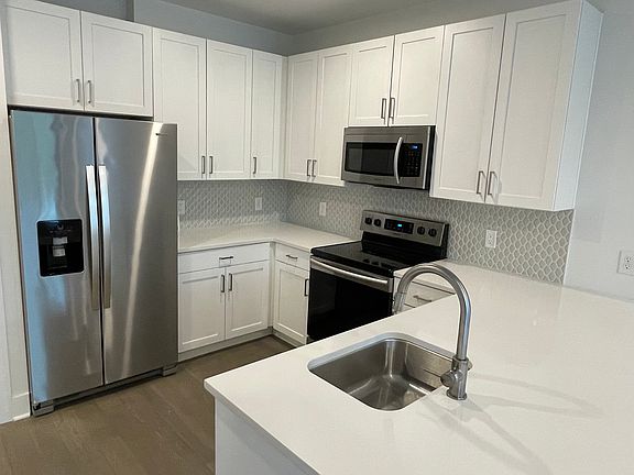 Spacious kitchen that is open to the main living area