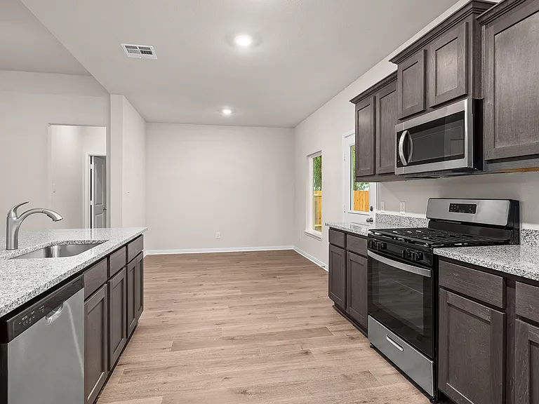 The dining room sits right off of the kitchen.