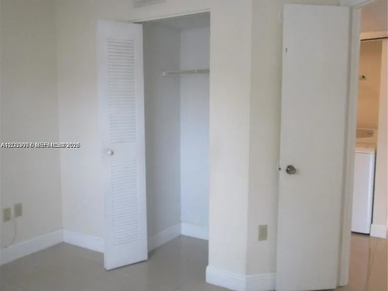 9491 Palm Cir S #205 — Photo 16