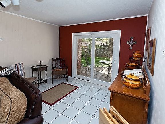 This sitting area is off of the Den & has lots of natural light and a new slid