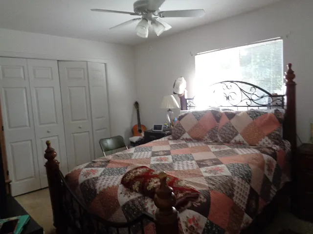 Inlaw suite bedroom, queen bed depicted
