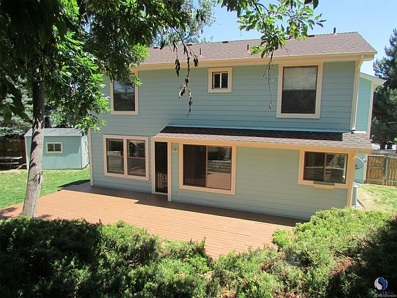This large, freshly stained deck is a great space for entertaining and relaxing