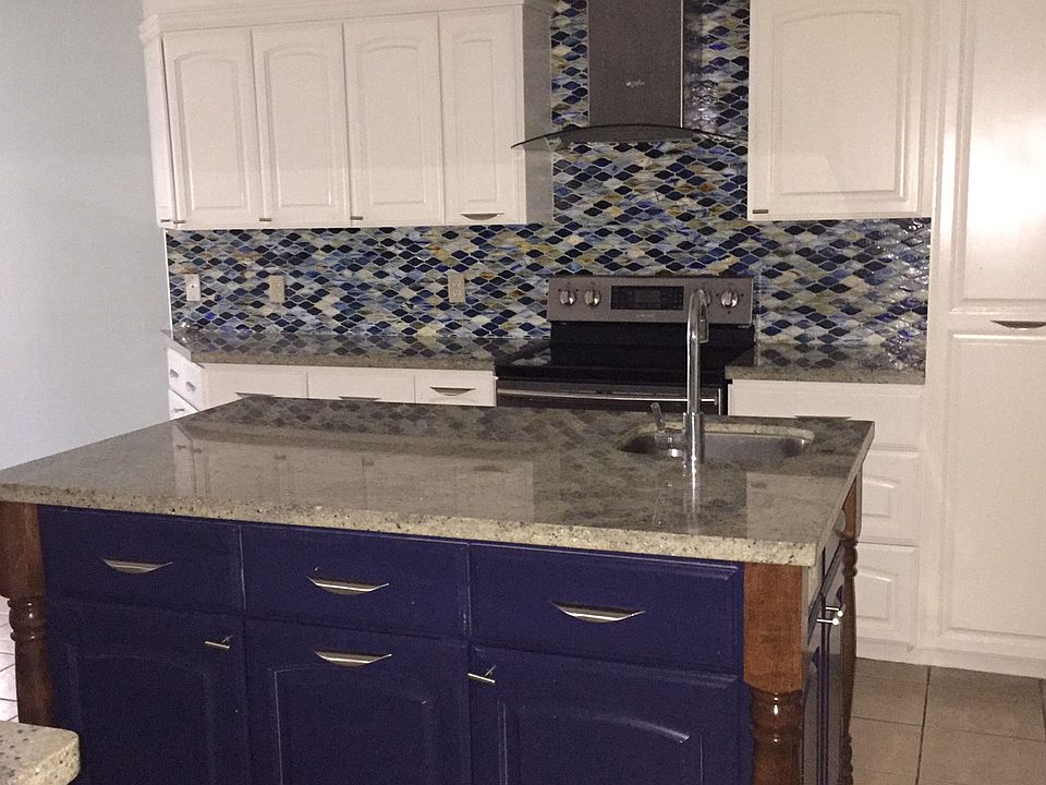 HUGE granite island w/sink