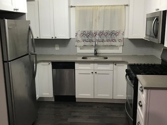 Modern kitchen with stainless steel appliances looking beautiful