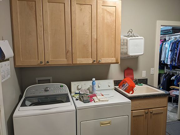 Mud room and wash room. Connected with walk-in closet and garage.