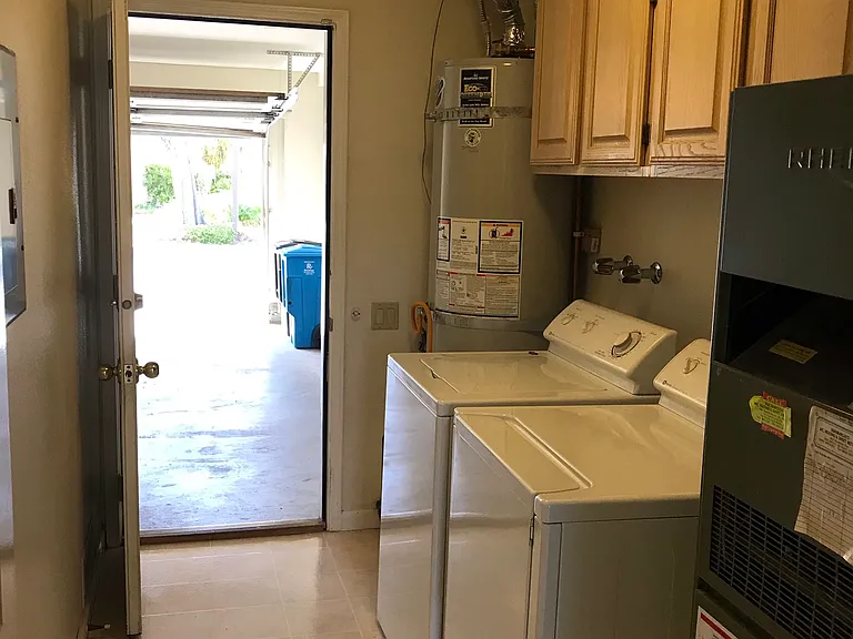 Laundry room with washer and dryer