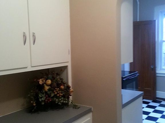 extra counter and cabinets going into kitchen