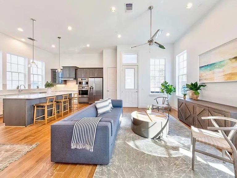 Open concept living room with beautiful natural light flooding in