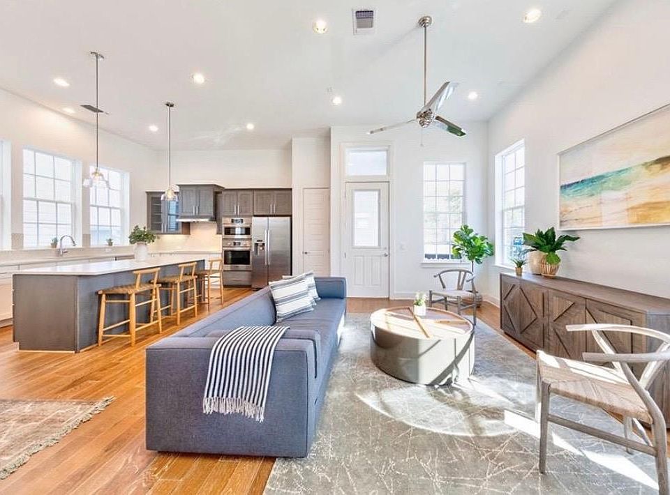 Open concept living room with beautiful natural light flooding in