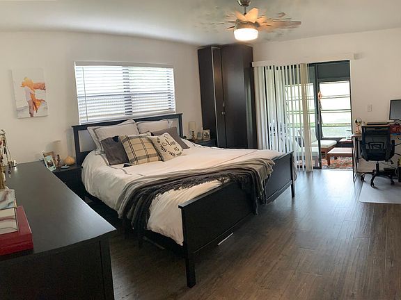 Master Bedroom. Large enough for King bed (shown) and desk.