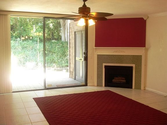 Living area/fireplace leading to patio