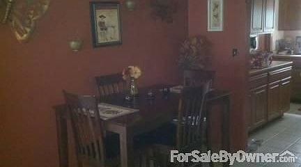 Dining Room
						:
						New ceiling fan installed within 1 year. Breakfast bar attached to kitchen.