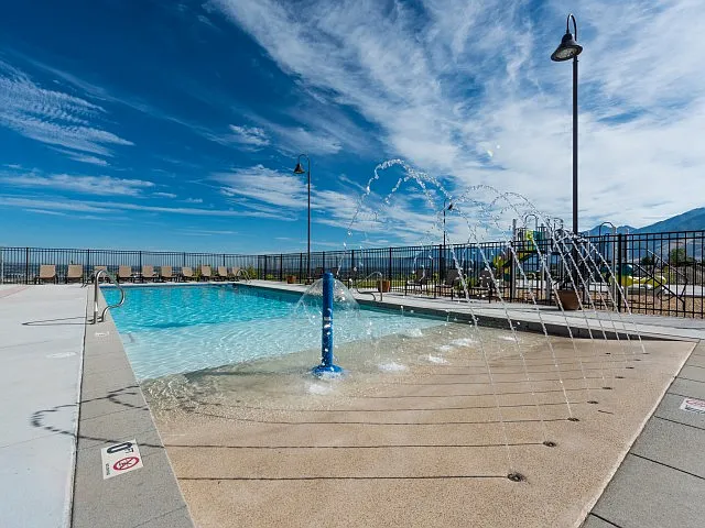 Beach Style Pool with Water Feature