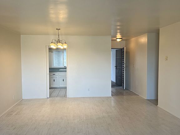 Living room with dining area facing kitchen