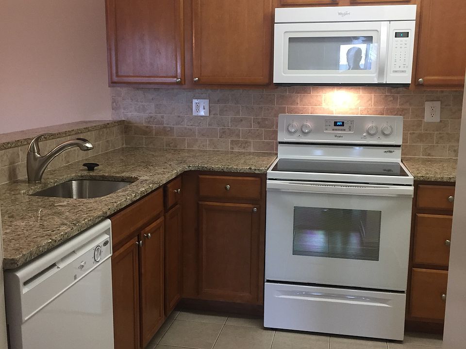 Kitchen showing stove, microwave and dishwashwer