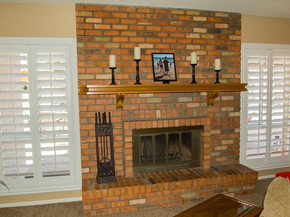 Wood burnig fireplace in family room