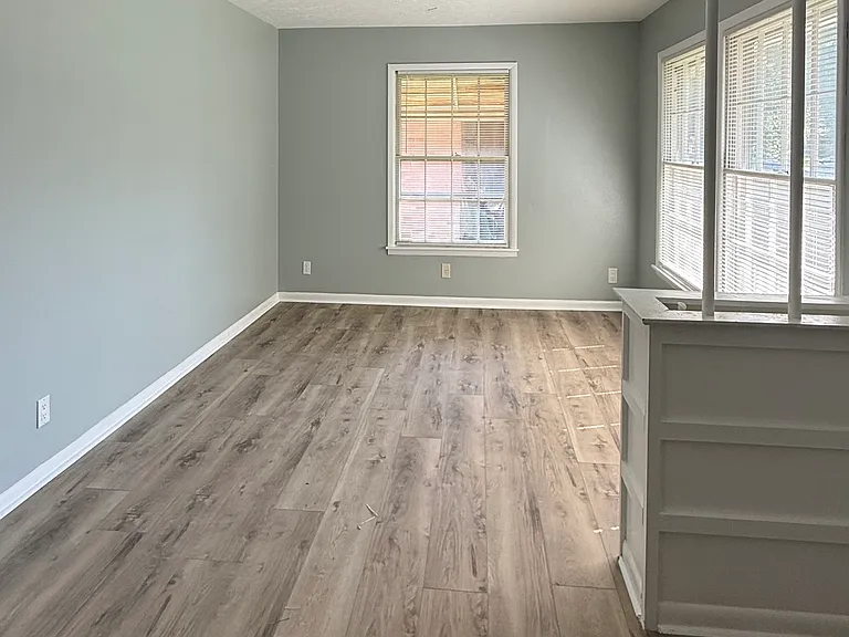 The main living room. The front door is just to the right next to the planter box.