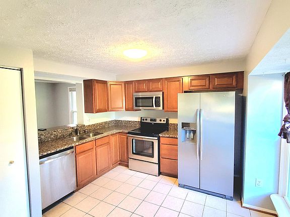 Kitchen with Granite countertops and SS appliances