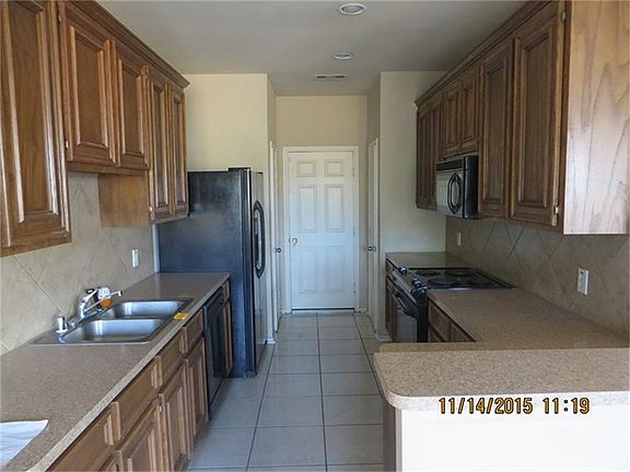 5th image of 702 Woodport Ln