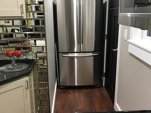 Kitchen and mudroom/laundry entrance to right