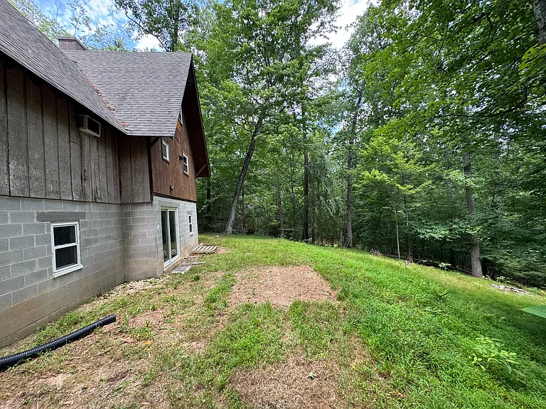 Back of home, with walk out basement door