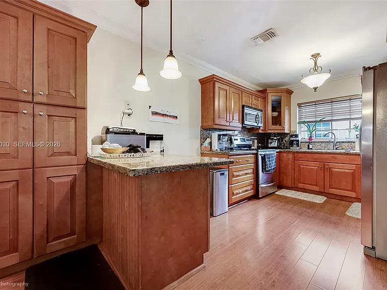 4477 SW 15th Ter #1 — Photo 2