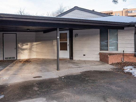 Oversized carport and covered entry.