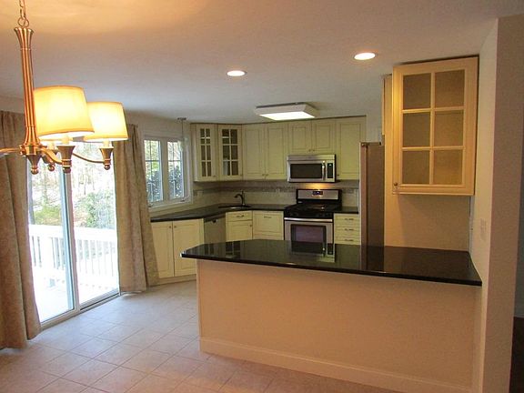 Kitchen Stainless steel appliances, granite countertops, plenty of cabinets