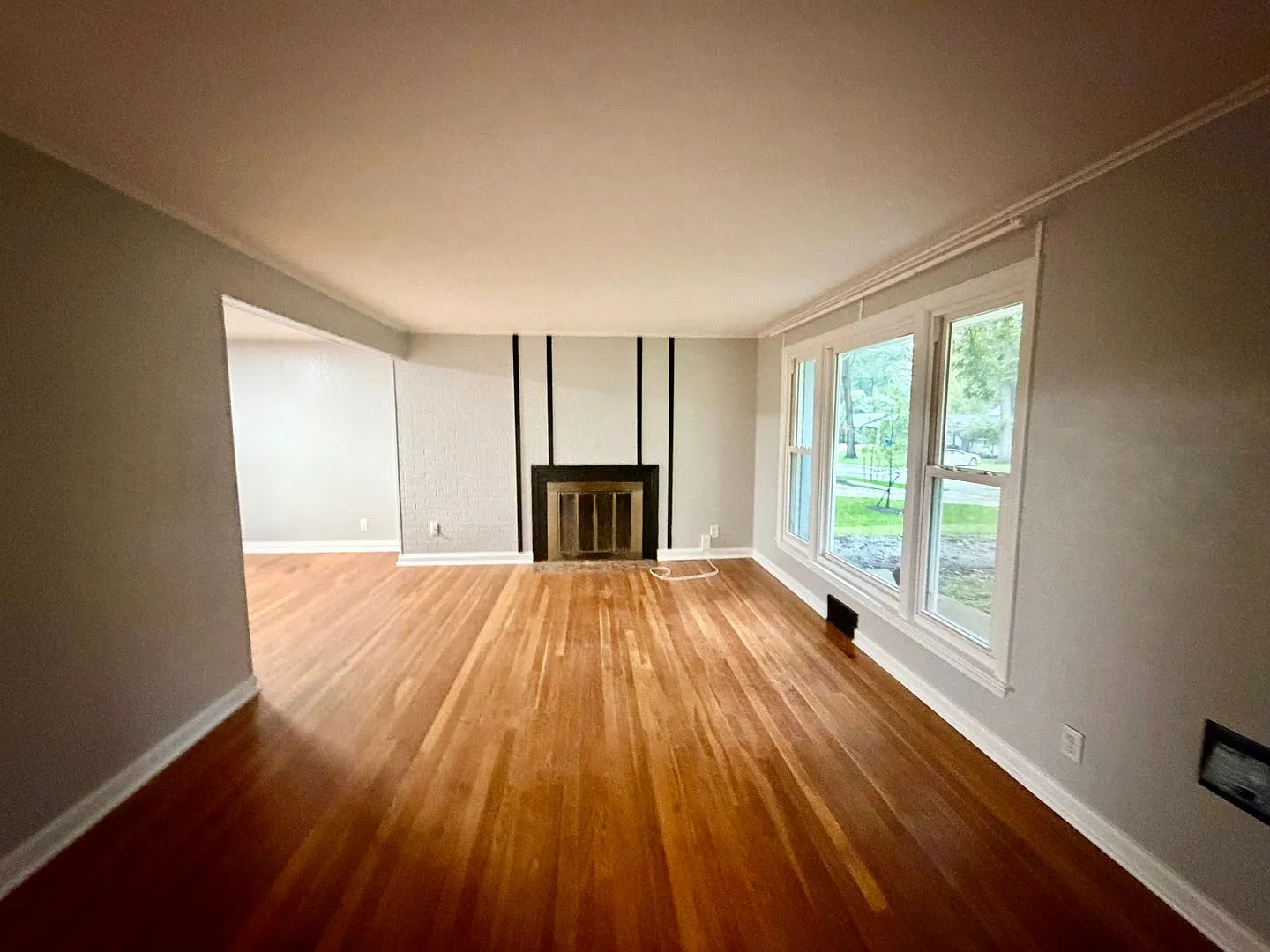  7047 Ranch with Hardwood Floors and Fresh Paint throughout + Large, Fenced Yard + 1 Car Garage — Photo 4