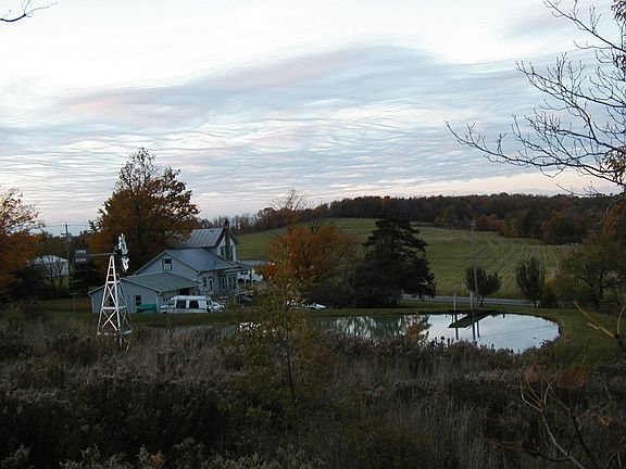 over-looking the pond and acreage