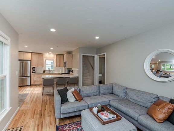 The open floor plan is great for entertaining and the new breakfast bar in the kitchen allows for easy dining space!