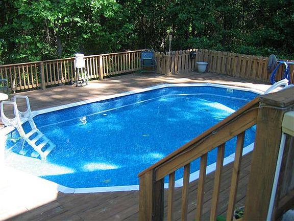 Above ground recessed pool. 