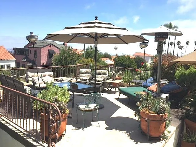 Shared large terrace with mountain and ocean views