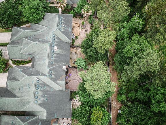 Great lot backing to forested area of trees.