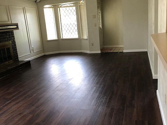 Spacious living room with fireplace