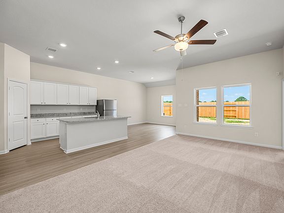 This home has an incredible open layout with the spacious family room open to the kitchen.