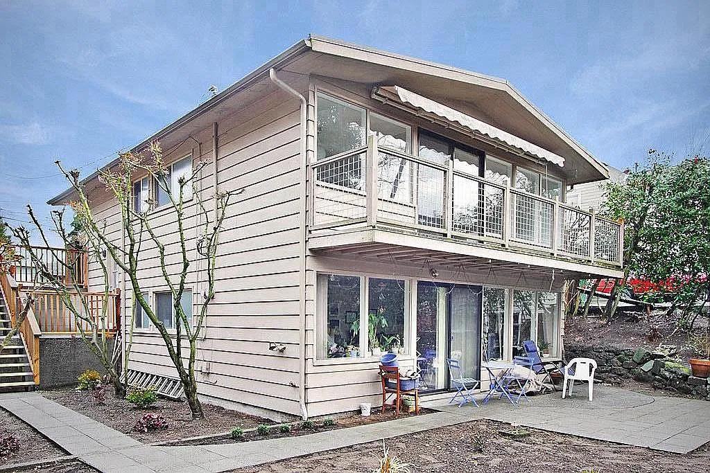 Photo 1 of 24 - 5521 25th Ave NE #TOP FLOOR - Seattle, WA Exterior 2 unit building SPECTACULAR SETTING backs up to Ravenna Park - 5521 25th Ave NE #TOP FLOOR