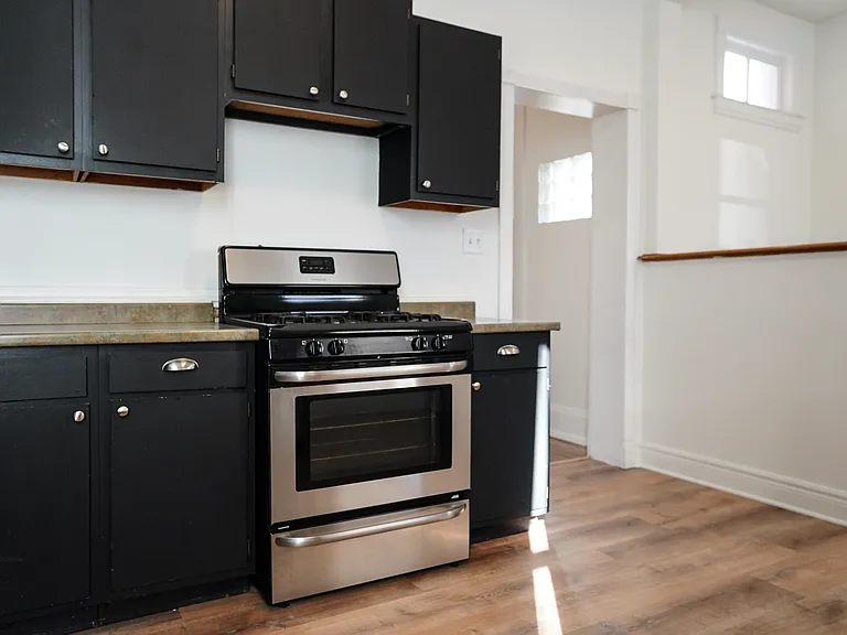 The kitchen also has newer appliances, including a new, never-used dishwasher and brand new flooring.