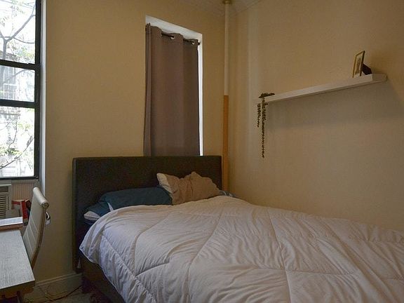 5th image of 243 E 13th St APT 6