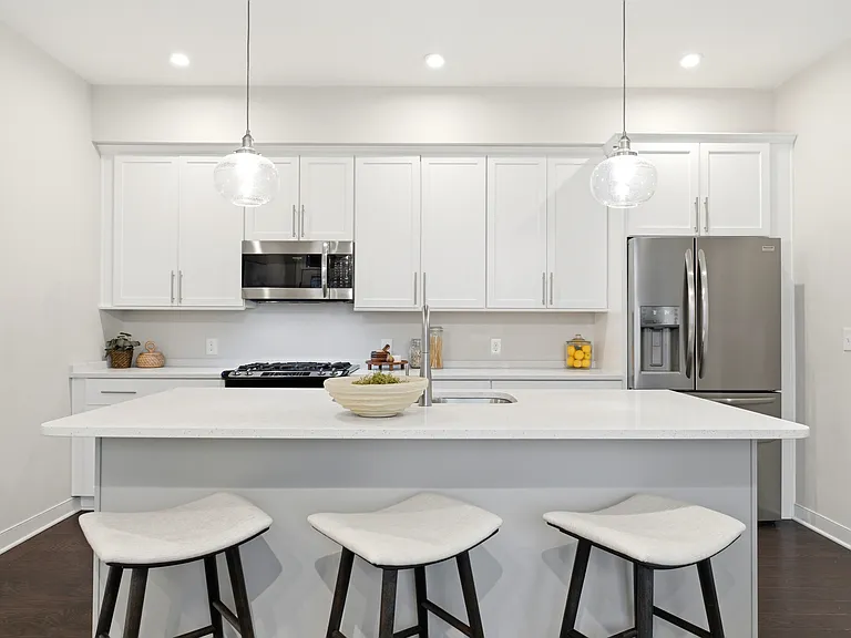 Island seating + Kitchen with Quartz countertops