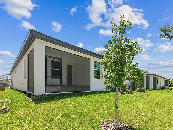 Sandpiper new construction quick move-in 3737 Nandina Cir - luxury paired villa at Fairway Pointe 55