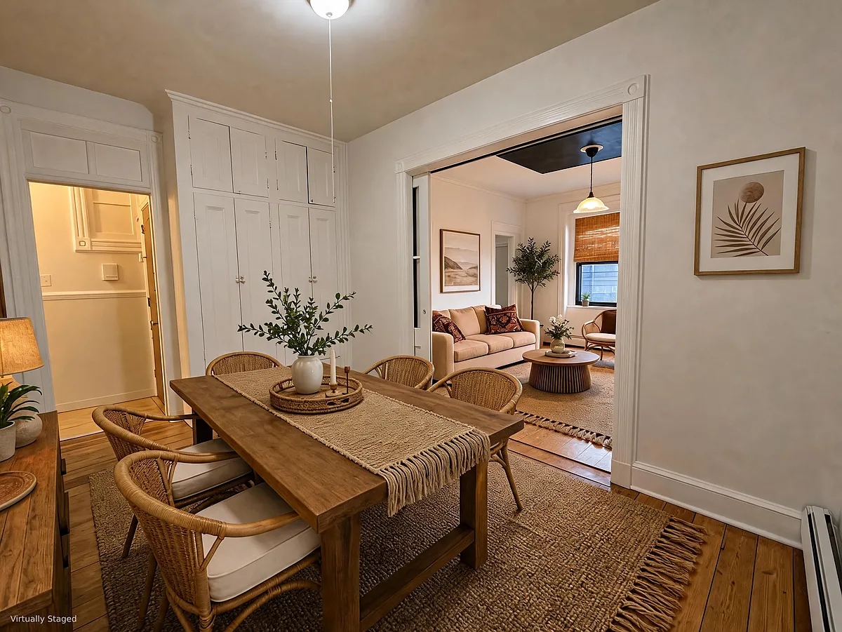 traditional dining room overlooking the living room. built-in storage closet and drawers in the far left corner. - 964 Summit Ave #2