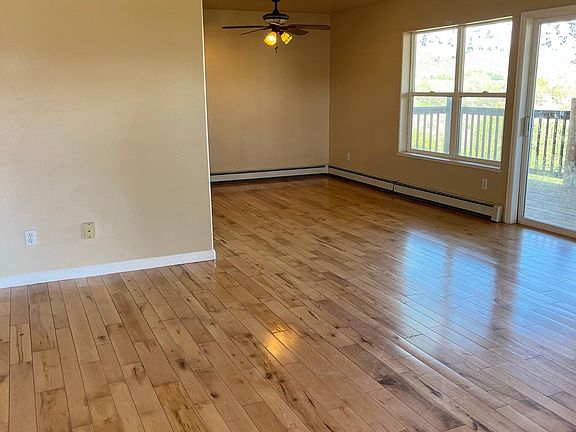Main entrance, living room area, and dining room area
