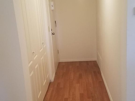 entry hallway with laundry closet