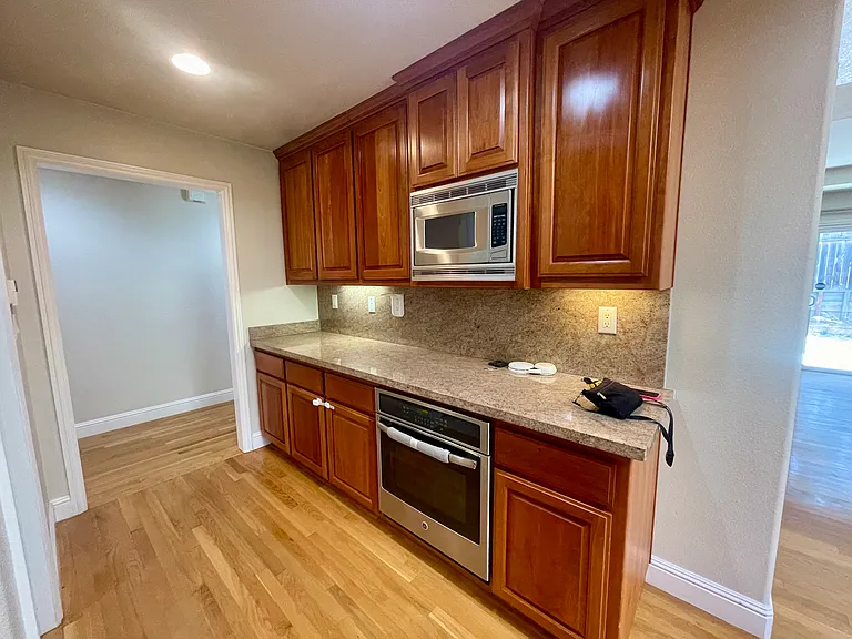 Kitchen- Beautiful cherry wood cabinets
