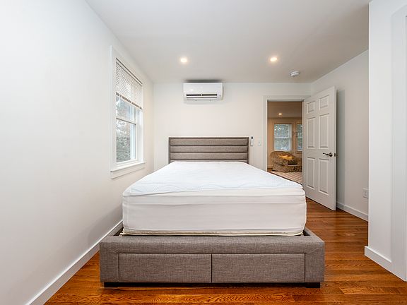 First bedroom with a Queen bed and closet.