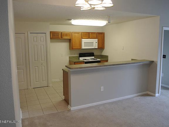 5th image of 6788 Manotak Oaks Dr Unit 203